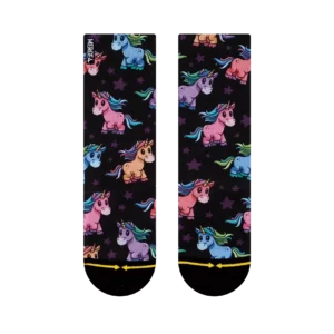 Two black socks with colorful unicorns and purple stars on a dark background.