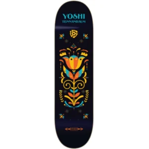 Dark navy skateboard deck with a bright symmetrical floral design in orange, yellow, teal; 'YOSH' text at top and a 'STEREO' logo at the bottom.