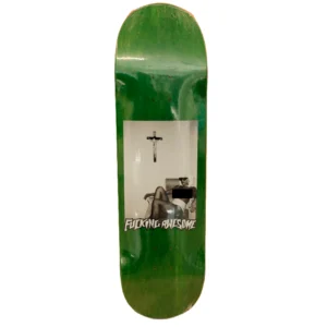 Green skateboard deck with a black-and-white photo of a lounging person, crucifix on the wall, and the 'Fucking Awesome' logo.