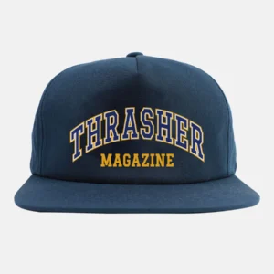 Blue baseball cap with 'THRASHER MAGAZINE' in white and yellow on the front panel.
